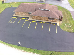 Wells Asphalt Sealcoat Parking Lot Striping and Marking Services - Madison County, Jersey County, Macoupin County, St Clair County, St Charles County, Lincoln County, Warren County, St Louis County, Green County, Jersey County